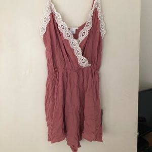 Pink lace surplice romper